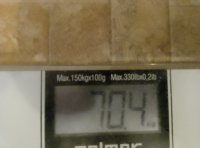 113025