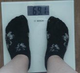 61007