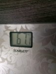 69027