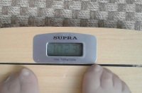 77235