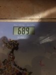 77857