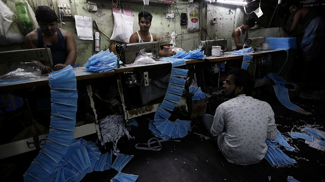 workers-making-face-mask-covid.png