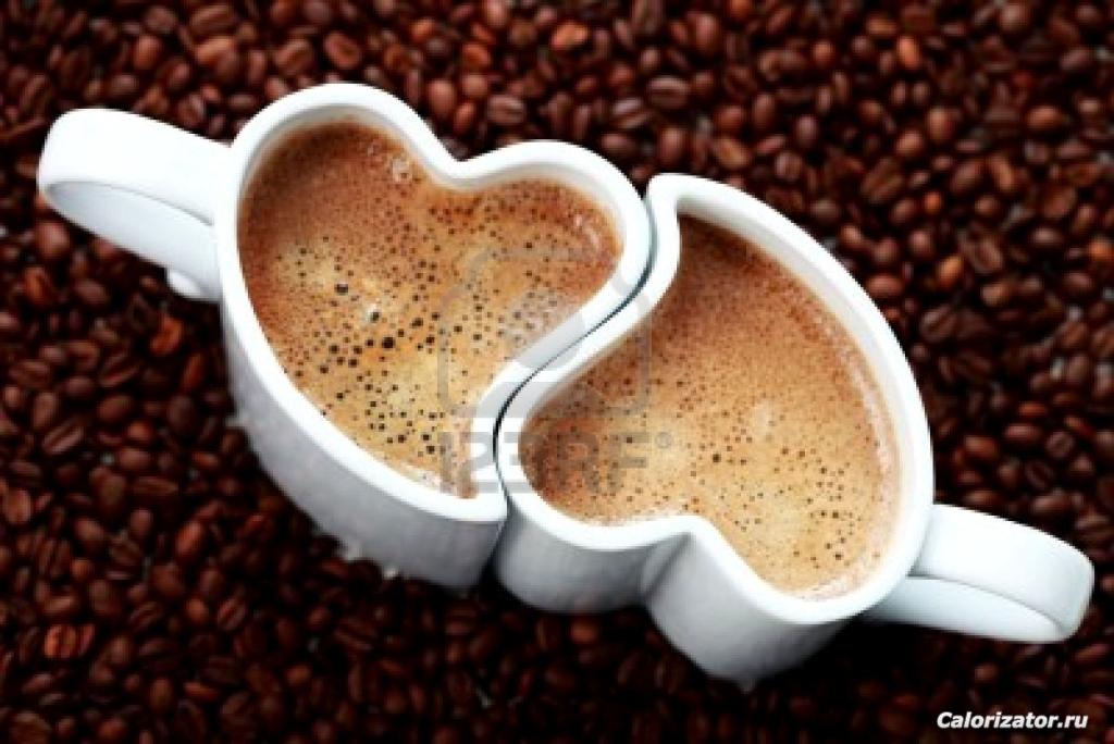 6876364-2-cups-of-coffee-shape-of-heart-and-coffee-beans-coffee-time-1ol1mat