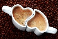 6876364-2-cups-of-coffee-shape-of-heart-and-coffee-beans-coffee-time-1ol1mat