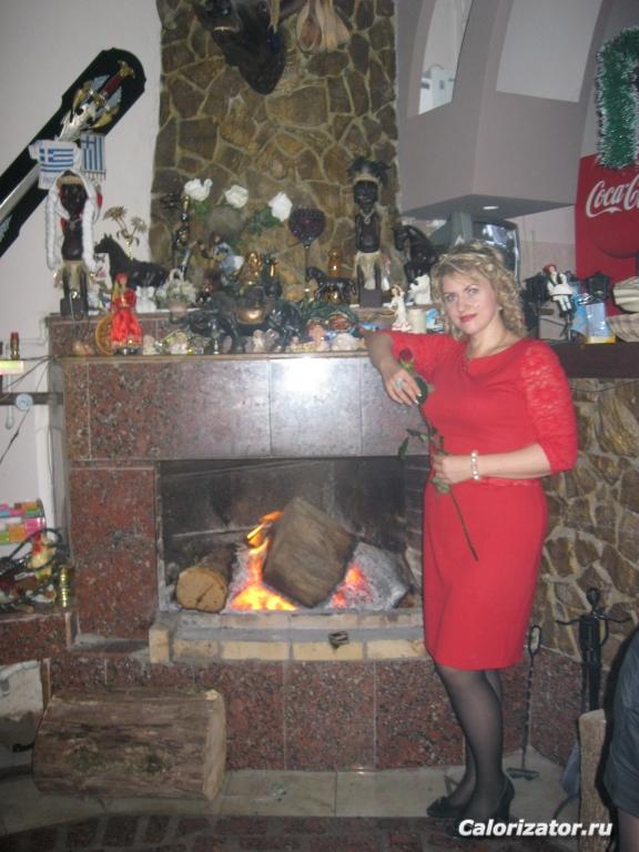 У камина